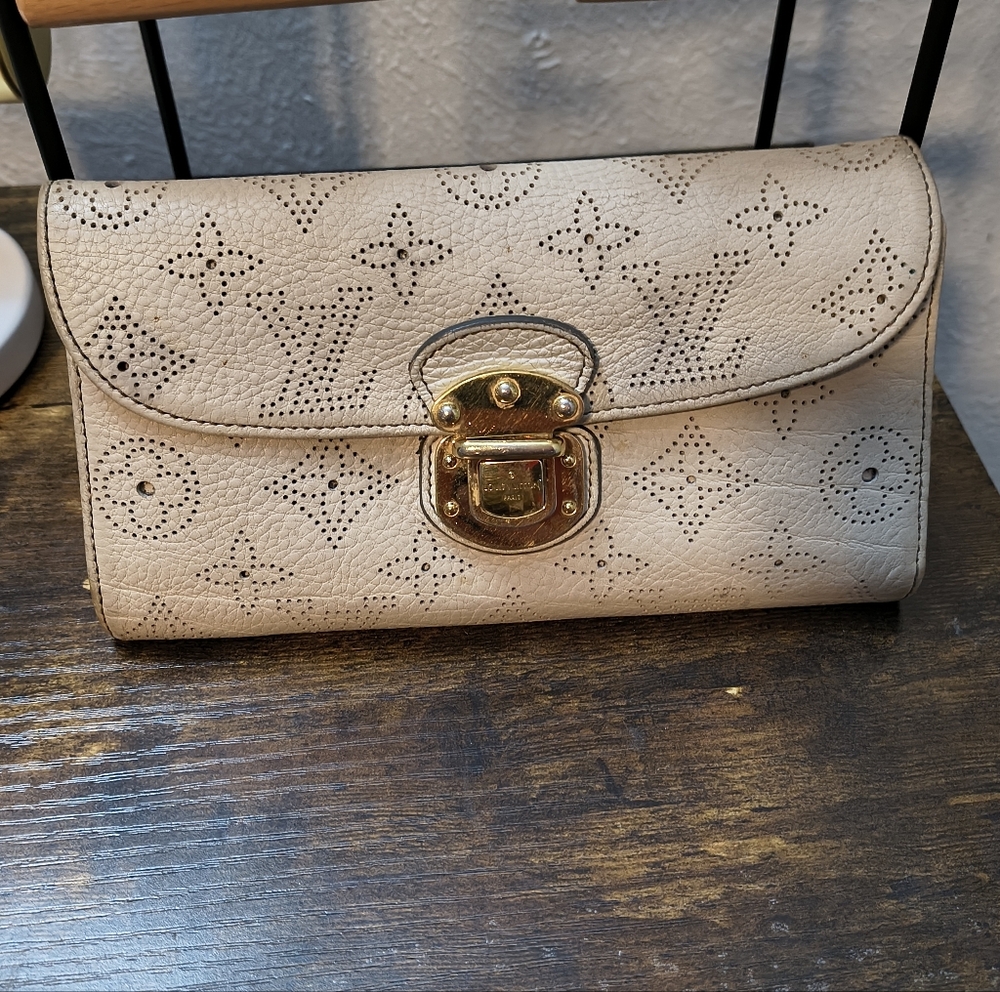 Louis Vuitton Beige Clutch with Gold Accents